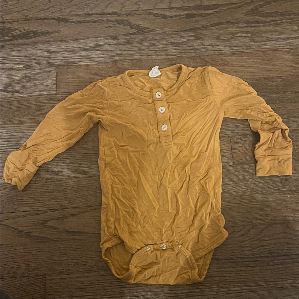 Kate Quinn Golden Long Sleeve One Piece